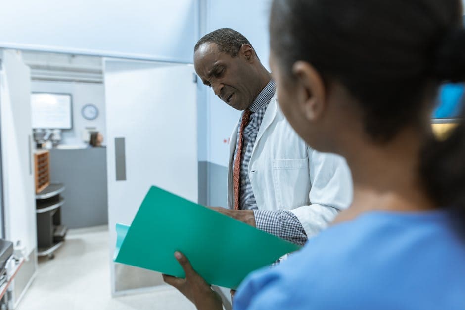 Medical office staff handling prior authorization workflow