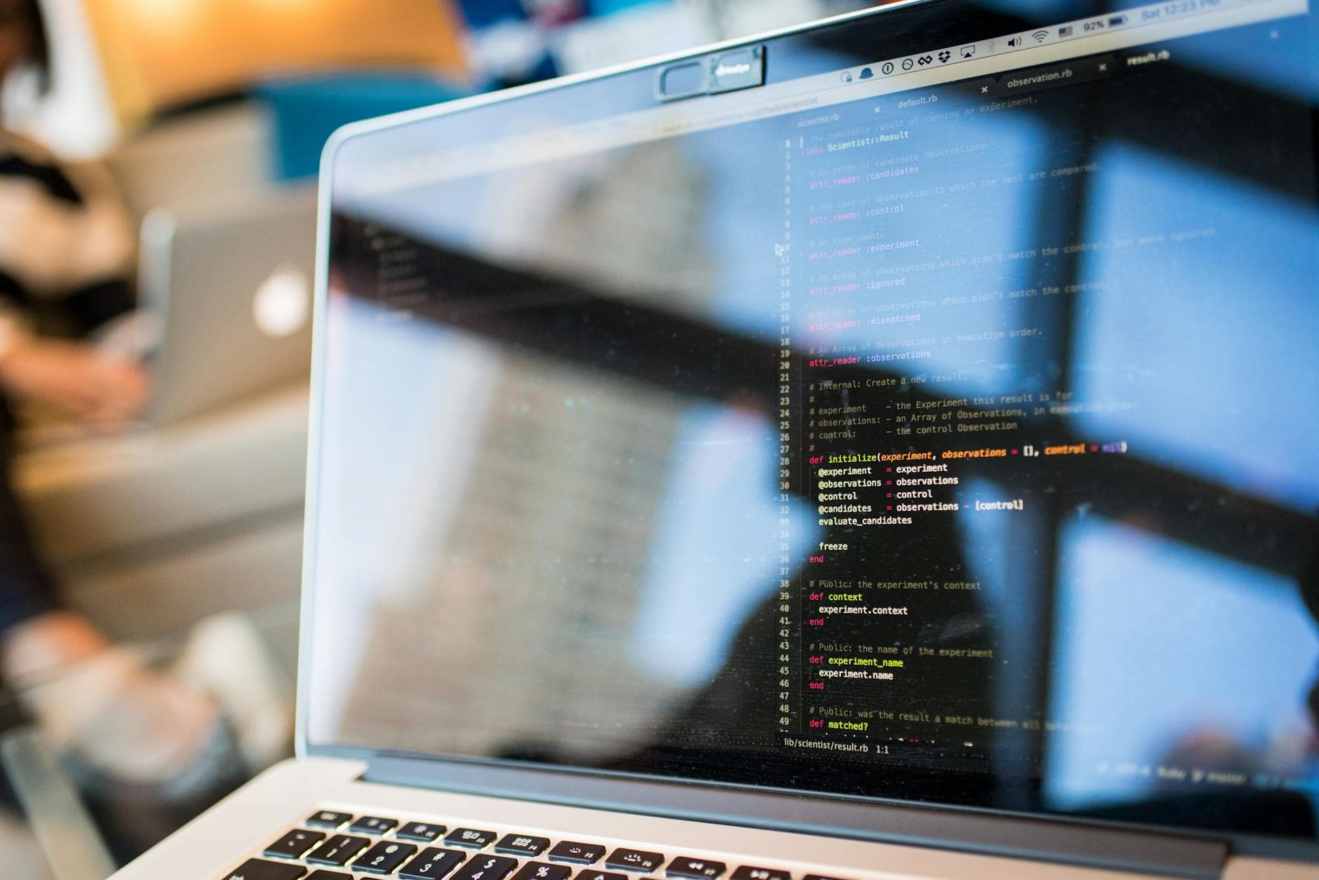 Developer building AI agent workflow automation software on a laptop